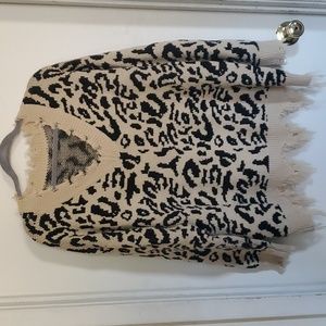 Distressed style animal print sweater